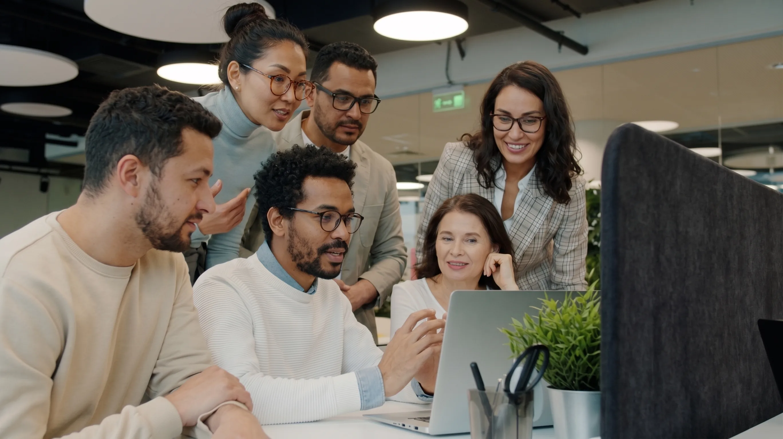Team analyzing financial information in an office